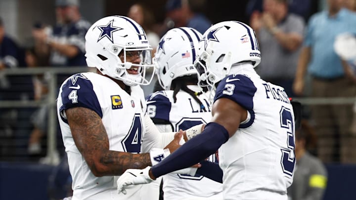 Dallas Cowboys quarterback Dak Prescott and receiver George Pickens celebrate a touchdown against the Washington Commanders Dallas Cowboys quarterback Dak Prescott and receiver George Pickens celebrate a touchdown against the Washington Commanders