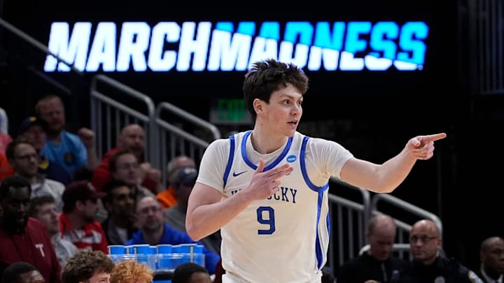 Kentucky forward Trent Noah (9) celebrates the three pointer during the first half of their first round NCAA men’ s basketball tournament game against Troy on Friday March 21, 2025 at Fiserv Forum in Milwaukee, Wis.
