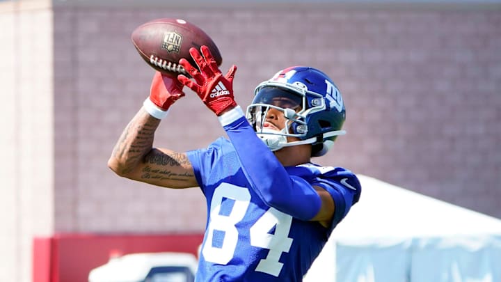New York Giants rookie wide receiver Jalin Hyatt (84) catches the ball during training camp in East