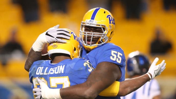 Nov 19, 2016; Pittsburgh, PA, USA;  Pittsburgh Panthers running back Qadree Ollison (37) and offensive lineman Jaryd Jones-Smith (55) celebrate a touchdown by Ollison against the Duke Blue Devils during the fourth quarter at Heinz Field. Pittsburgh won 56-14. Mandatory Credit: Charles LeClaire-USA TODAY Sports