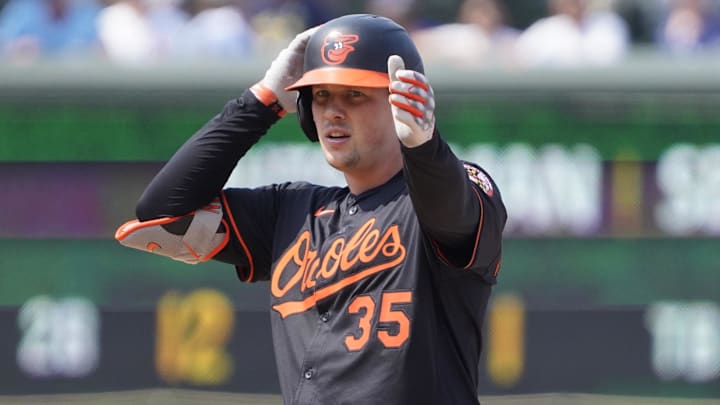 Aug 1, 2025; Chicago, Illinois, USA; Baltimore Orioles catcher Adley Rutschman (35) gestures after hitting a double against the Chicago Cubs during the ninth inning at Wrigley Field. Mandatory Credit: David Banks-Imagn Images Aug 1, 2025; Chicago, Illinois, USA; Baltimore Orioles catcher Adley Rutschman (35) gestures after hitting a double against the Chicago Cubs during the ninth inning at Wrigley Field. Mandatory Credit: David Banks-Imagn Images