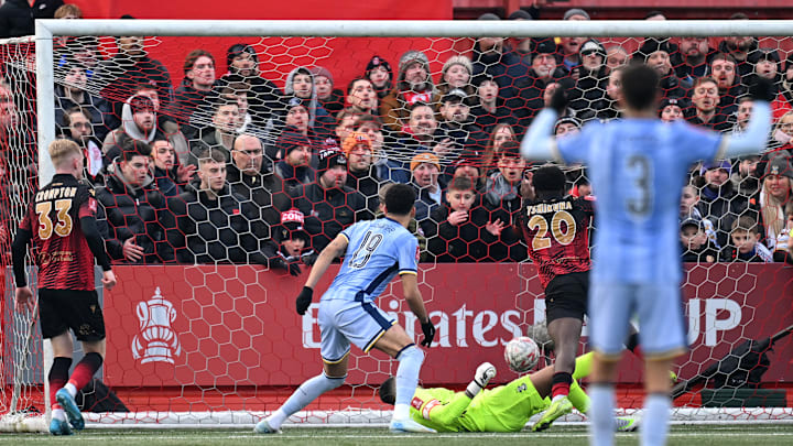 Dominic Solanke helps force the ball in against Tamworth 