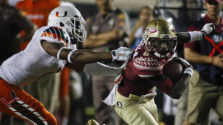 Oct 10, 2015; Tallahassee, FL, USA; Miami Hurricanes defensive back Deon Bush (2) tries to stop