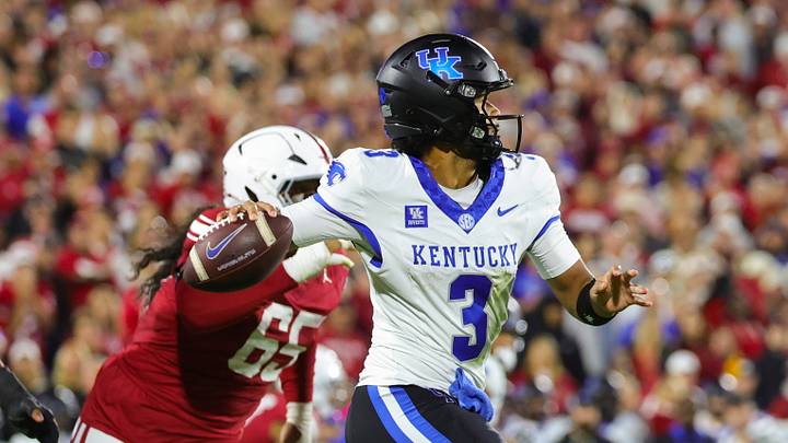 Oct 17, 2026; Norman, Oklahoma, USA; Kentucky Wildcats quarterback Kenny Minchey (3) throws as Oklahoma Sooners defensive lineman Jayden Jackson (65) chases during the game at Gaylord Family-Oklahoma Memorial Stadium. Mandatory Credit: Kevin Jairaj-Imagn Images Oct 17, 2026; Norman, Oklahoma, USA; Kentucky Wildcats quarterback Kenny Minchey (3) throws as Oklahoma Sooners defensive lineman Jayden Jackson (65) chases during the game at Gaylord Family-Oklahoma Memorial Stadium. Mandatory Credit: Kevin Jairaj-Imagn Images