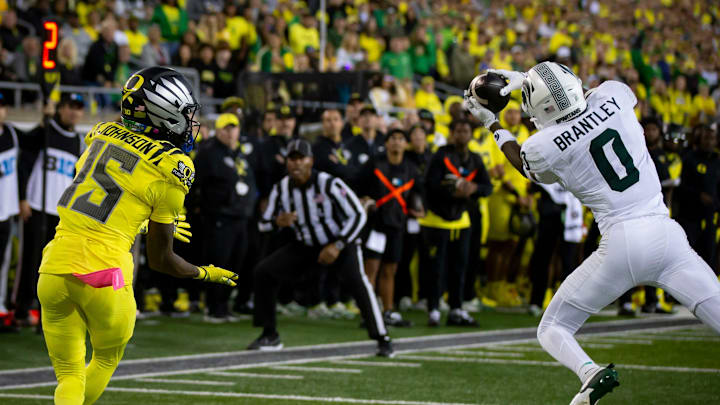 Michigan State Spartans defensive back Charles Brantley intercepts a pass intended for Oregon Ducks wide receiver Tez Johnson as the Ducks host the Spartans Friday, Oct. 4, 2024 at Autzen Stadium in Eugene, Ore.