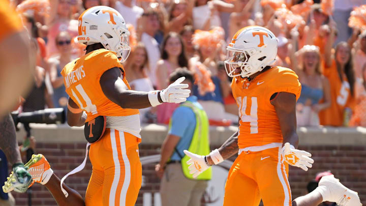 Tennessee wide receivers Mike Matthews (4) and Braylon Staley (14) celebrate Matthew's touchdown with a dance during an NCAA college football game against UAB on September 20, 2025, in Knoxville, Tennessee.