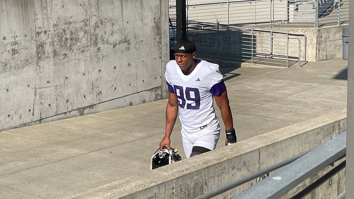 Russell Davis heads to UW fall practice. Russell Davis heads to UW fall practice.