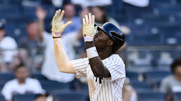Aug 10, 2024; Bronx, New York, USA; New York Yankees third baseman Jazz Chisholm Jr. (13) reacts after hitting a solo home run against the Texas Rangers during the eighth inning at Yankee Stadium. Mandatory Credit: John Jones-USA TODAY Sports