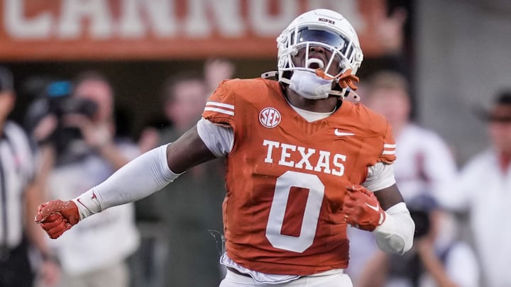 Nov 23, 2024; Austin, Texas, USA; Texas Longhorns linebacker Anthony Hill Jr. (0) celebrates after a stop against the Kentucky Wildcats on fourth down in the third quarter at Darrell K Royal Texas Memorial Stadium. Mandatory Credit: Ricardo B. Brazziell/USA TODAY Network via Imagn Images