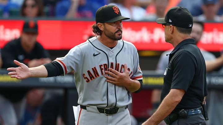 New York City, New York, USA;  San Francisco Giants manager Tony Vitello (23) argues with second base umpire Dan Iassogna (58) after being ejected during the second inning against the New York Mets at Citi Field. Mandatory Credit: Vincent Carchietta-Imagn Images