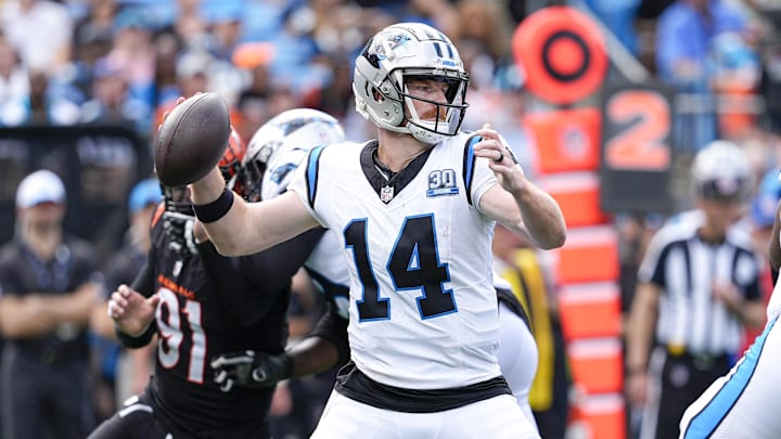 Sep 29, 2024; Charlotte, North Carolina, USA; Carolina Panthers quarterback Andy Dalton (14) throws a pass against the Cincinnati Bengals during the third quarter at Bank of America Stadium. Mandatory Credit: Jim Dedmon-Imagn Images