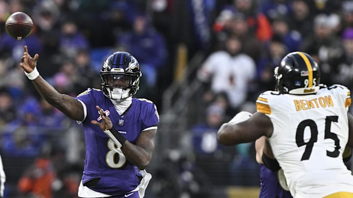 Dec 21, 2024; Baltimore, Maryland, USA; Baltimore Ravens quarterback Lamar Jackson (8) throws as Pittsburgh Steelers defensive tackle Keeanu Benton (95) applies pressure during the first quarter at M&T Bank Stadium. Mandatory Credit: Tommy Gilligan-Imagn Images