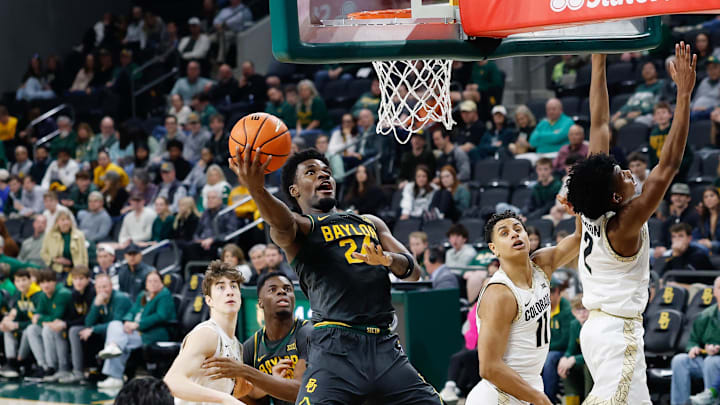 Feb 4, 2026; Waco, Texas, USA; Baylor Bears guard Tounde Yessoufou (24) scores a basket against Colorado Buffaloes