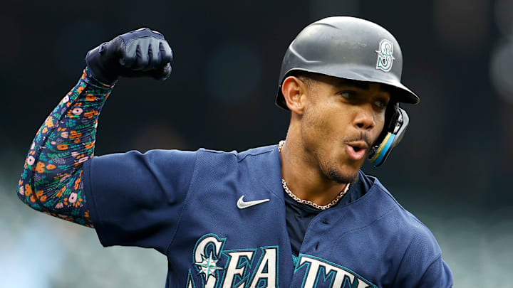 Julio Rodriguez of the Seattle Mariners celebrates a home run against the Detroit Tigers.
