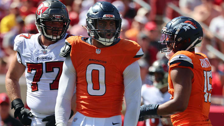 Sep 22, 2024; Tampa, Florida, USA; Denver Broncos linebacker Jonathon Cooper (0) celebrates after he sacked Tampa Bay Buccaneers quarterback Baker Mayfield (6) (not pictured) during the second half at Raymond James Stadium.