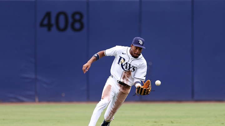 With the Steinbrenner Field wall looming in the background, Chandler Simpson makes a catch for the Rays.