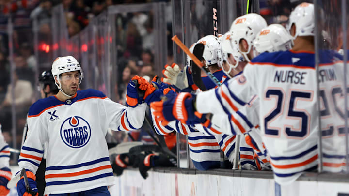 Edmonton Oilers defenseman Evan Bouchard (2) celebrates with teammates. Credit: Kiyoshi Mio-Imagn Images