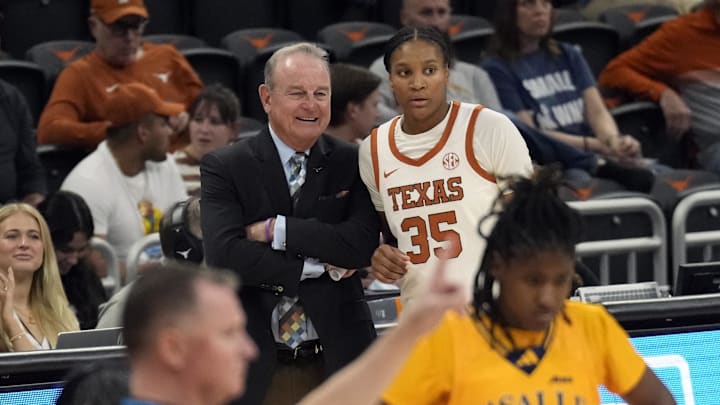 Dec 17, 2024; Austin, Texas, USA; Texas Longhorns head coach Vic Schaefer talks with forward Madison Booker (35) during the second half against the LaSalle Explorers  at Moody Center. Mandatory Credit: Scott Wachter-Imagn Images