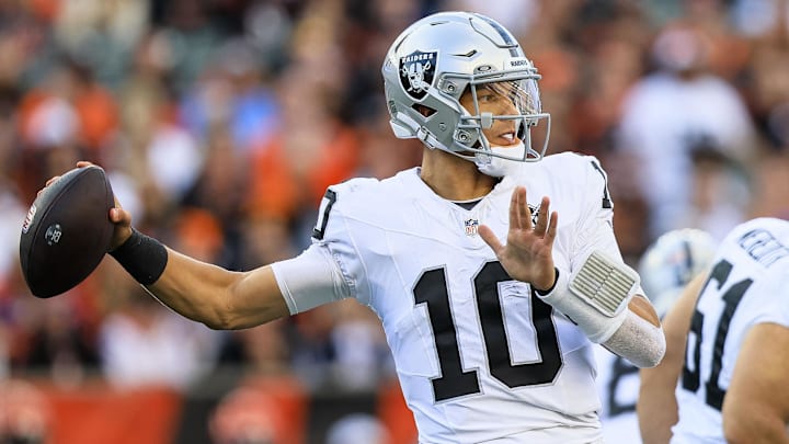 Nov 3, 2024; Cincinnati, Ohio, USA; Las Vegas Raiders quarterback Desmond Ridder (10) throws a pass against the Cincinnati Bengals in the second half at Paycor Stadium. Mandatory Credit: Katie Stratman-Imagn Images
