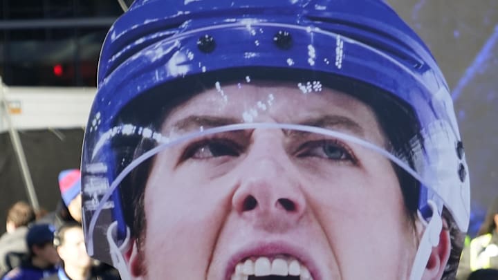 Apr 24, 2024; Toronto, Ontario, CAN; A fan holds up a large photo of Toronto Maple Leafs forward