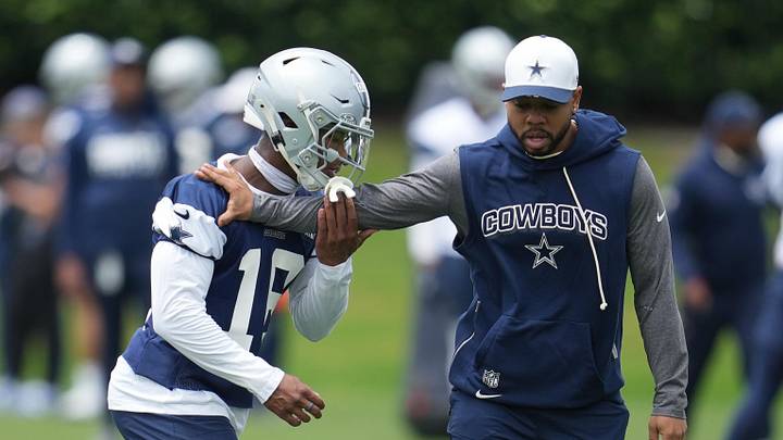 Dallas Cowboys cornerback Caleb Downs and defensive coordinator Christian Parker.