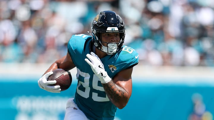 Sep 7, 2025; Jacksonville, Florida, USA; Jacksonville Jaguars tight end Brenton Strange (85) runs with the ball against the Carolina Panthers in the first quarter at EverBank Stadium. Mandatory Credit: Nathan Ray Seebeck-Imagn Images