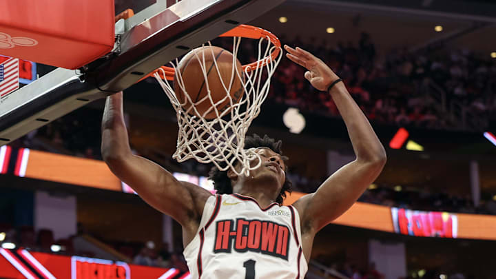 Jan 5, 2025; Houston, Texas, USA;  Houston Rockets forward Amen Thompson (1) dunks against the Los Angeles Lakers in the first quarter at Toyota Center. Mandatory Credit: Thomas Shea-Imagn Images