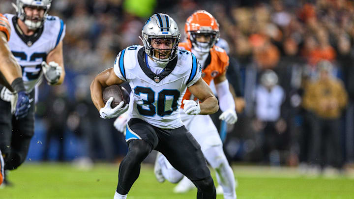 Nov 9, 2023; Chicago, Illinois, USA; Carolina Panthers running back Chuba Hubbard (30) runs the ball against the Chicago Bears during the first quarter at Soldier Field. Nov 9, 2023; Chicago, Illinois, USA; Carolina Panthers running back Chuba Hubbard (30) runs the ball against the Chicago Bears during the first quarter at Soldier Field.