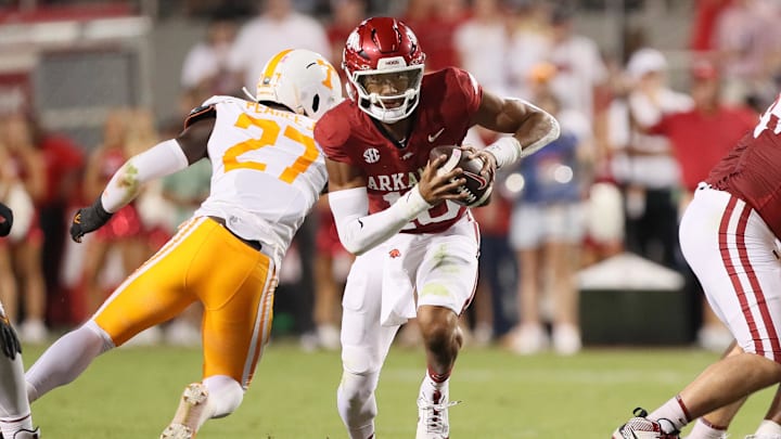 Oct 5, 2024; Fayetteville, Arkansas, USA; Arkansas Razorbacks quarterback Taylen Green (10) rushes in the first quarter against the Tennessee Volunteers at Donald W. Reynolds Razorback Stadium. Mandatory Credit: Nelson Chenault-Imagn Images