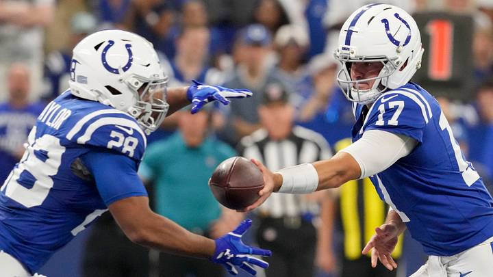 Indianapolis Colts quarterback Daniel Jones (17) looks to hand the ball to Indianapolis Colts running back Jonathan Taylor (28) on Sunday, Sept. 13, 2026, during a game against the Baltimore Ravens at Lucas Oil Stadium in Indianapolis. Indianapolis Colts quarterback Daniel Jones (17) looks to hand the ball to Indianapolis Colts running back Jonathan Taylor (28) on Sunday, Sept. 13, 2026, during a game against the Baltimore Ravens at Lucas Oil Stadium in Indianapolis.
