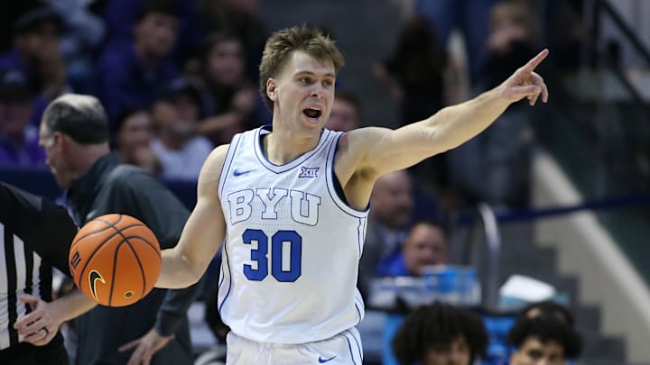 Dallin Hall directs the offense against TCU