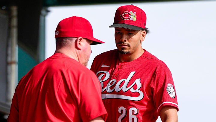 Cincinnati Reds director of pitching Derek Johnson (36) talks with pitcher Chase Burns (26) during a warmup session at the Cincinnati Reds player development complex in Goodyear, Ariz., on Wednesday, Feb. 11, 2026. Cincinnati Reds director of pitching Derek Johnson (36) talks with pitcher Chase Burns (26) during a warmup session at the Cincinnati Reds player development complex in Goodyear, Ariz., on Wednesday, Feb. 11, 2026.
