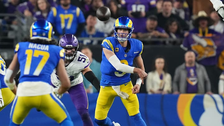 Los Angeles Rams quarterback Matthew Stafford (9) throws the ball to receiver Puka Nacua (17) against the Minnesota Vikings during their playoff game at State Farm Stadium on Jan. 13, 2025, in Glendale. Los Angeles Rams quarterback Matthew Stafford (9) throws the ball to receiver Puka Nacua (17) against the Minnesota Vikings during their playoff game at State Farm Stadium on Jan. 13, 2025, in Glendale.