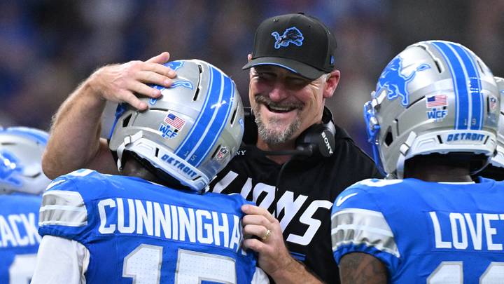 Detroit Lions head coach Dan Campbell greets wide receiver Malik Cunningham (15).