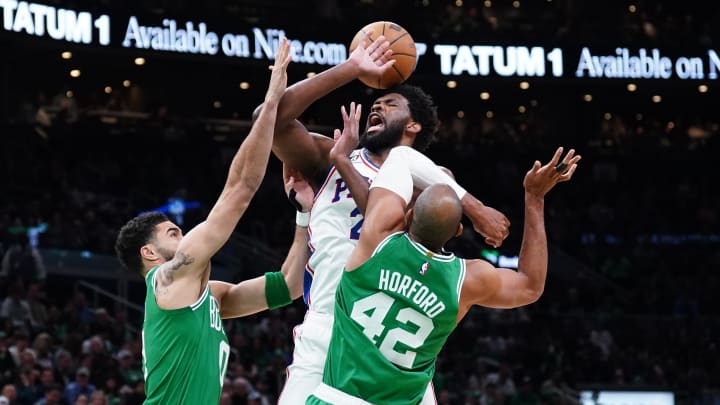 May 3, 2023; Boston, Massachusetts, USA; Boston Celtics forward Jayson Tatum (0) and center Al Horford (42) defend against Philadelphia 76ers center Joel Embiid (21) in the first quarter during game two of the 2023 NBA playoffs at TD Garden. Mandatory Credit: David Butler II-USA TODAY Sports