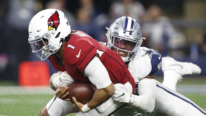 Arizona Cardinals quarterback Kyler Murray is sacked by Dallas Cowboys defensive end Dorance Armstrong.