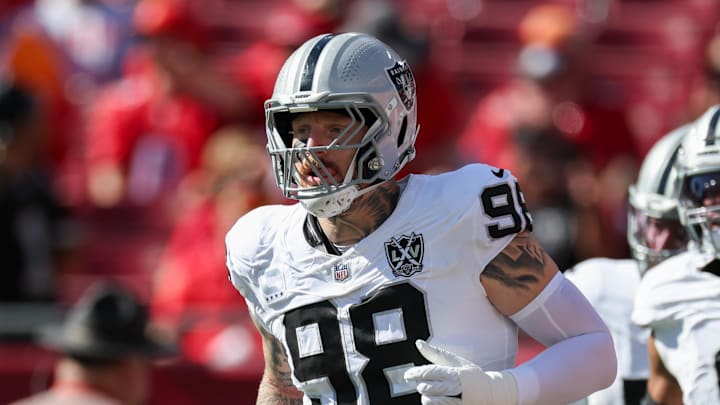 Dec 8, 2024; Tampa, Florida, USA; Las Vegas Raiders defensive end Maxx Crosby (98) takes the field for a game against the Tampa Bay Buccaneers at Raymond James Stadium. Mandatory Credit: Nathan Ray Seebeck-Imagn Images Dec 8, 2024; Tampa, Florida, USA; Las Vegas Raiders defensive end Maxx Crosby (98) takes the field for a game against the Tampa Bay Buccaneers at Raymond James Stadium. Mandatory Credit: Nathan Ray Seebeck-Imagn Images