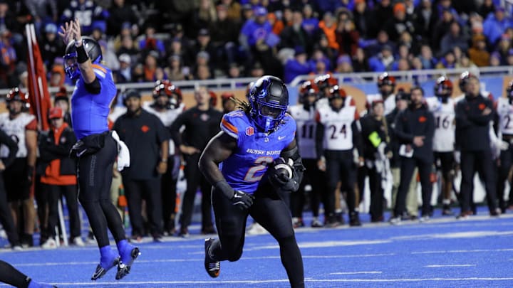 Nov 1, 2024; Boise, Idaho, USA; Boise State Broncos running back Ashton Jeanty (2) runs for a score during the second half against the San Diego State Aztecs at Albertsons Stadium. Boise State defeats San Diego State  56-24. Mandatory Credit: Brian Losness-Imagn Images


