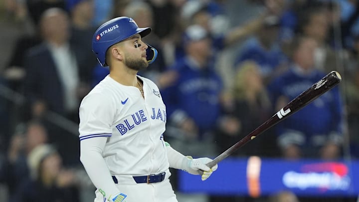 Nov 1, 2025; Toronto, Ontario, CAN; Toronto Blue Jays designated hitter Bo Bichette (11) hits a three run home run against the Los Angeles Dodgers in the third inning during game seven of the 2025 MLB World Series at Rogers Centre. Mandatory Credit: John E. Sokolowski-Imagn Images