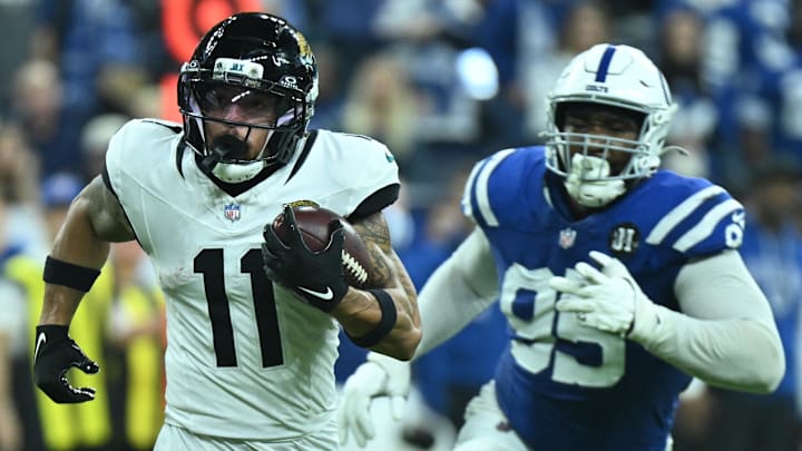 Dec 28, 2025; Indianapolis, Indiana, USA; Jacksonville Jaguars wide receiver Parker Washington (11) runs against Indianapolis Colts defensive tackle Adetomiwa Adebawore (95) during the second half at Lucas Oil Stadium. Mandatory Credit: Robert Goddin-Imagn Images Dec 28, 2025; Indianapolis, Indiana, USA; Jacksonville Jaguars wide receiver Parker Washington (11) runs against Indianapolis Colts defensive tackle Adetomiwa Adebawore (95) during the second half at Lucas Oil Stadium. Mandatory Credit: Robert Goddin-Imagn Images