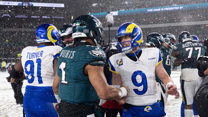 Jan 19, 2025; Philadelphia, Pennsylvania, USA; Philadelphia Eagles quarterback Jalen Hurts (1) and Los Angeles Rams quarterback Matthew Stafford (9) shake hands after a 2025 NFC divisional round game at Lincoln Financial Field. Mandatory Credit: Bill Streicher-Imagn Images