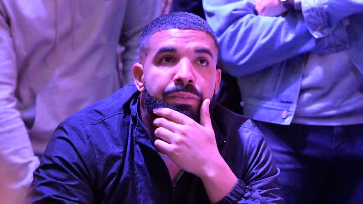 Jun 13, 2019; Toronto, Ontario, Canada; Recording artist Drake watches with Toronto Raptors fans as they cheer on their team in the NBA Finals against Golden State Warriors at the Jurassic Park watch party at Scotiabank Arena. Jun 13, 2019; Toronto, Ontario, Canada; Recording artist Drake watches with Toronto Raptors fans as they cheer on their team in the NBA Finals against Golden State Warriors at the Jurassic Park watch party at Scotiabank Arena.