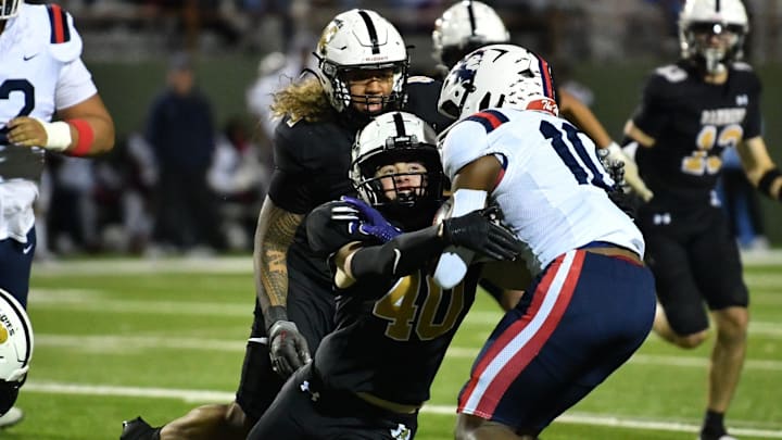 Amarillo's Troy Brown (40) takes down Richland's Jayshon Gibson (10) during an Area playoff game on Saturday, November 23, 2024 at Memorial Stadium.