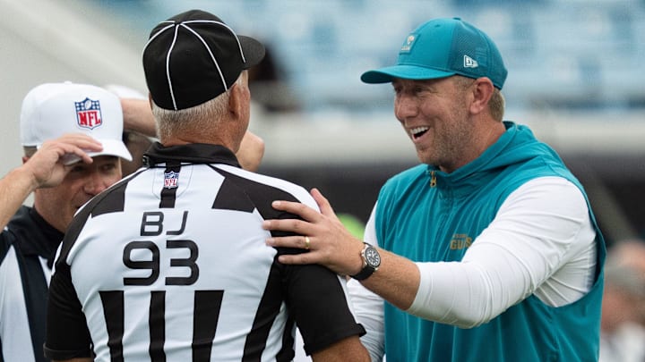 Jaguars Head Coach Liam Coen talks with the back judge before the first preseason game where the Jacksonville Jaguars hosted the Pittsburgh Steelers Saturday Aug. 9, 2025, at EverBank Stadium in Jacksonville, Fla. [Doug Engle/Florida Times-Union]