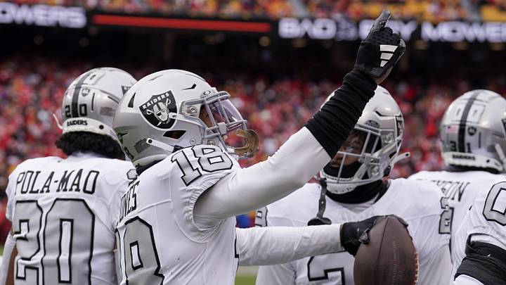 Dec 25, 2023; Kansas City, Missouri, USA; Las Vegas Raiders cornerback Jack Jones (18) celebrates against the Kansas City Chiefs after scoring on a pick six interception during the game at GEHA Field at Arrowhead Stadium. The touchdown was called back due to a penalty. Mandatory Credit: Denny Medley-USA TODAY Sports Dec 25, 2023; Kansas City, Missouri, USA; Las Vegas Raiders cornerback Jack Jones (18) celebrates against the Kansas City Chiefs after scoring on a pick six interception during the game at GEHA Field at Arrowhead Stadium. The touchdown was called back due to a penalty. Mandatory Credit: Denny Medley-USA TODAY Sports