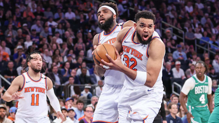 May 10, 2025; New York, New York, USA; New York Knicks center Karl-Anthony Towns (32) grabs a rebound in the fourth quarter against the Boston Celtics during game three of the second round for the 2025 NBA Playoffs at Madison Square Garden. Mandatory Credit: Wendell Cruz-Imagn Images