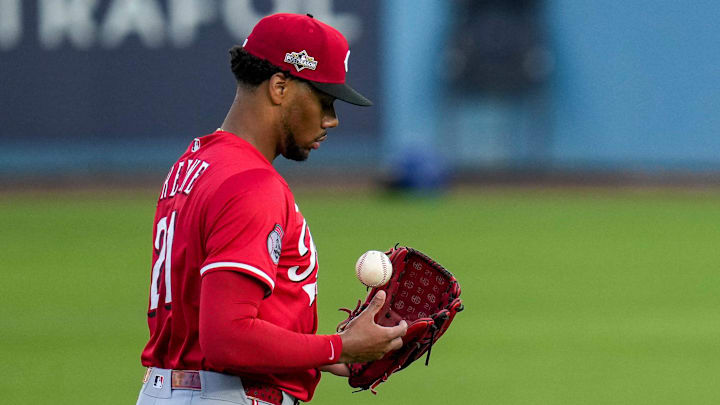 Cincinnati Reds starting pitcher Hunter Greene (21) wraps up before the first inning of the MLB National League Wild Card Game 1 between the Los Angeles Dodgers and the Cincinnati Reds at Dodger Stadium in Los Angeles on Tuesday, Sept. 30, 2025. The Dodgers won game 1 of the series, 10-5. Cincinnati Reds starting pitcher Hunter Greene (21) wraps up before the first inning of the MLB National League Wild Card Game 1 between the Los Angeles Dodgers and the Cincinnati Reds at Dodger Stadium in Los Angeles on Tuesday, Sept. 30, 2025. The Dodgers won game 1 of the series, 10-5.