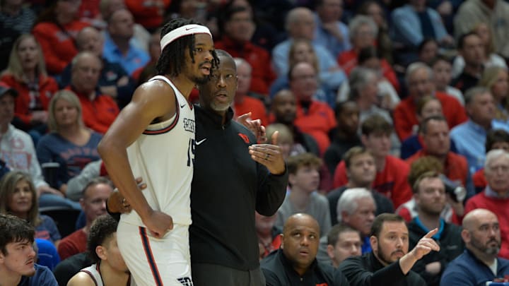 Feb 27, 2024; Dayton, Ohio, USA; Dayton Flyers forward DaRon Holmes II (15) listens to head coach Anthony Grant during the first half of the game at University of Dayton Arena. Mandatory Credit: Matt Lunsford-USA TODAY Sports Feb 27, 2024; Dayton, Ohio, USA; Dayton Flyers forward DaRon Holmes II (15) listens to head coach Anthony Grant during the first half of the game at University of Dayton Arena. Mandatory Credit: Matt Lunsford-USA TODAY Sports