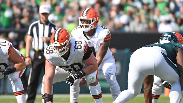 Oct 13, 2024; Philadelphia, Pennsylvania, USA; Cleveland Browns quarterback Deshaun Watson (4) waits for the snap from guard Michael Dunn (68) against the Philadelphia Eagles at Lincoln Financial Field. Mandatory Credit: Eric Hartline-Imagn Images