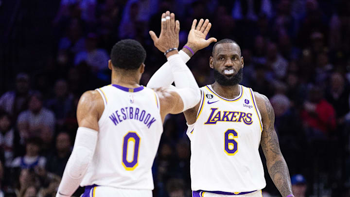 Los Angeles Lakers forward LeBron James (6) and guard Russell Westbrook (0) against the Philadelphia 76ers at Wells Fargo Center. 